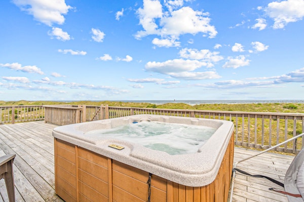 Coastal home with private pool, game room, media lounge, oceanside deck