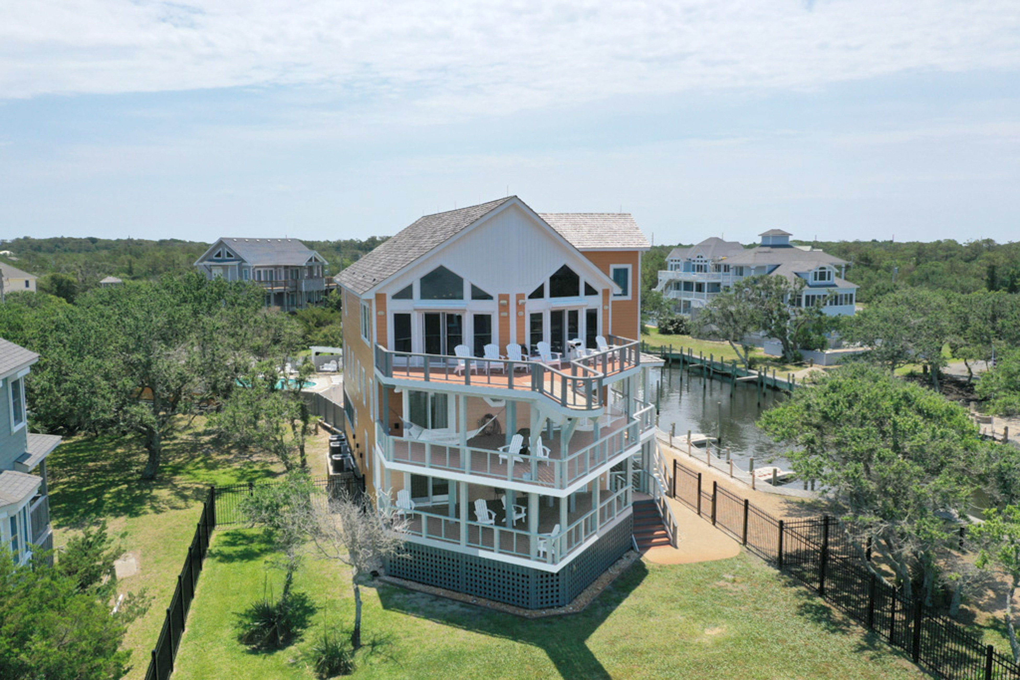 Waterfront home with ocean views, private pool, hot tub, & Tesla/EV charger