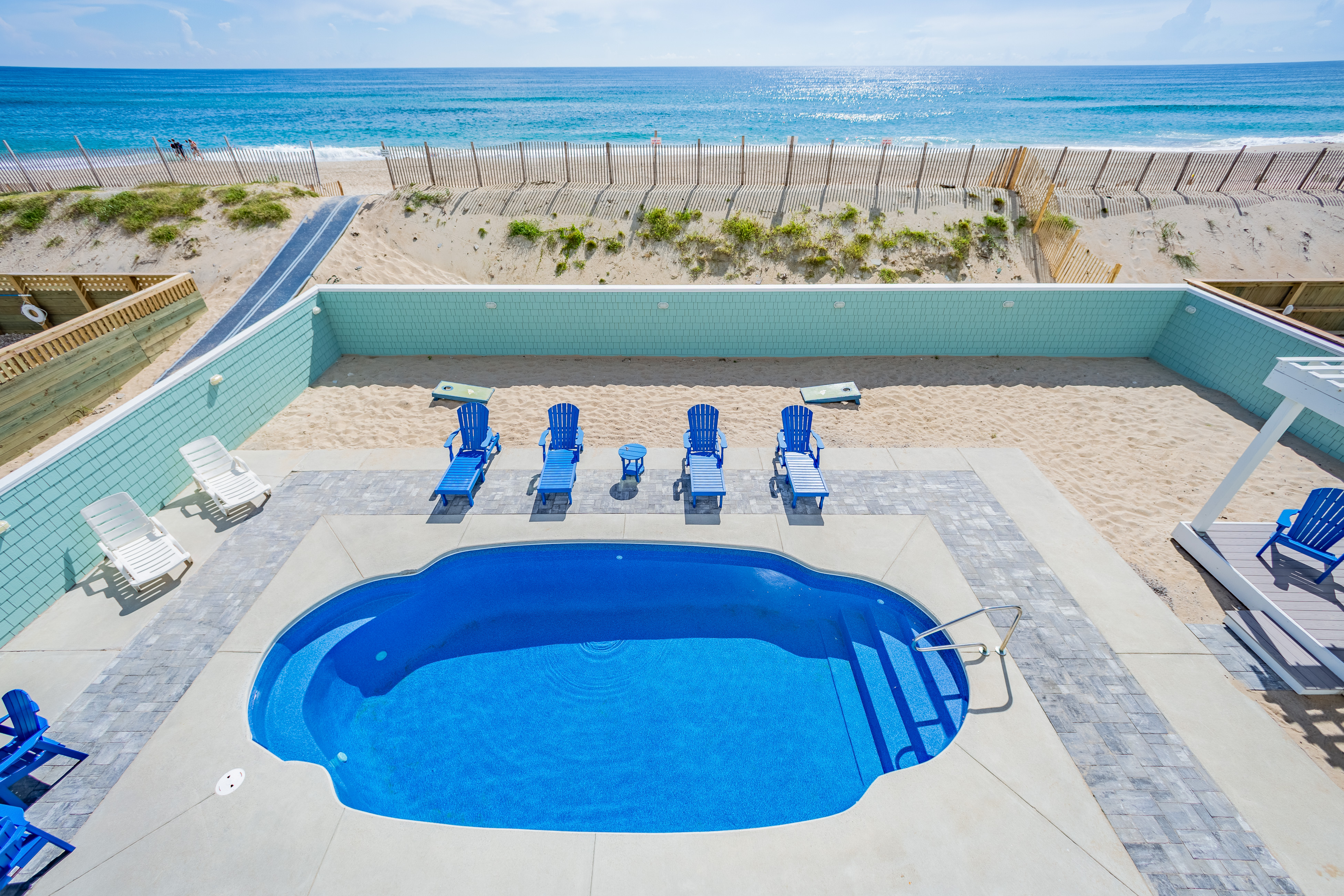 Lovely beachfront home with hot tub, pool, game room, & central AC