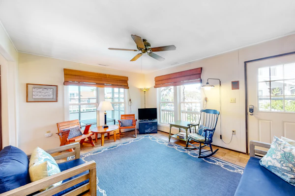 Waterfront home on a scenic canal with a dock, screened porch & fast WiFi