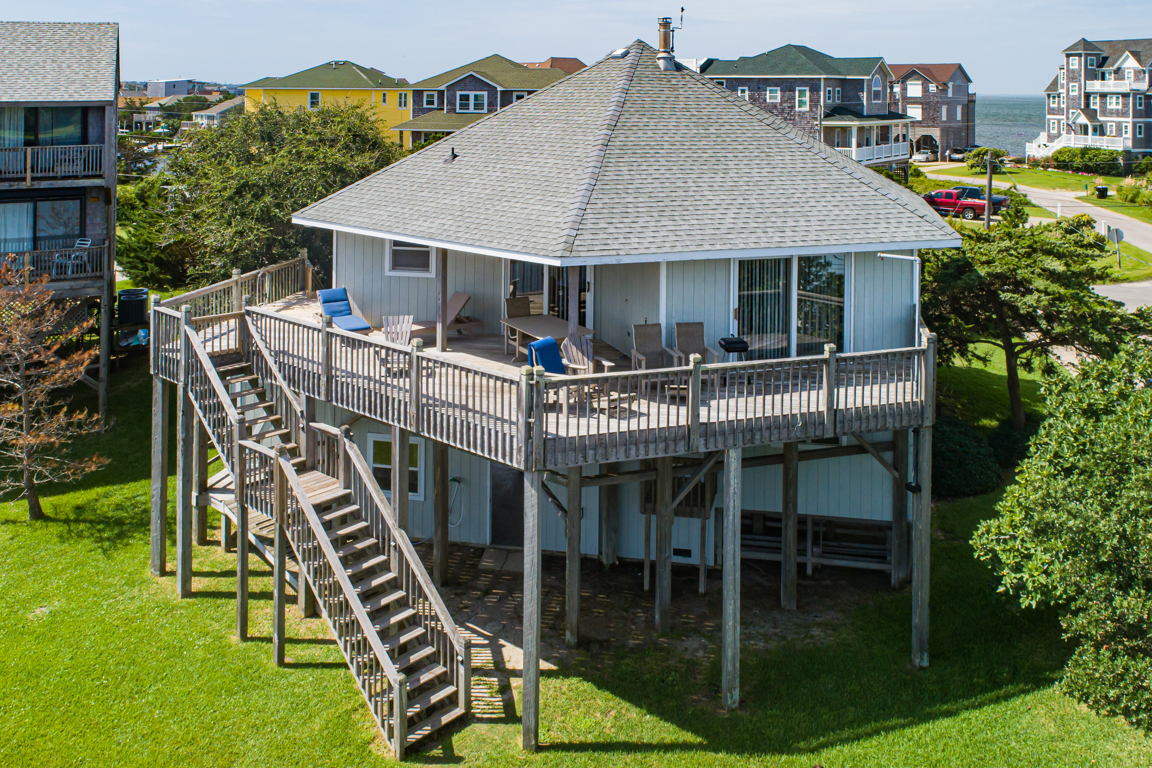 Sunny canal-front home w/deck, boat dock, private washer/dryer, & central AC