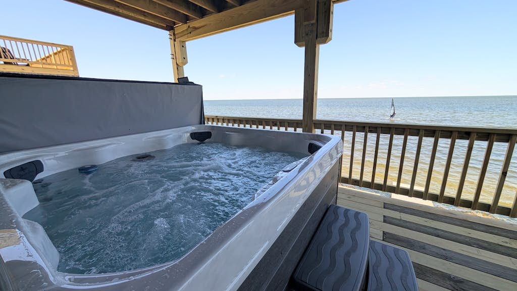 Great sound view waterfront home with private hot tub, AC, W/D & pool access
