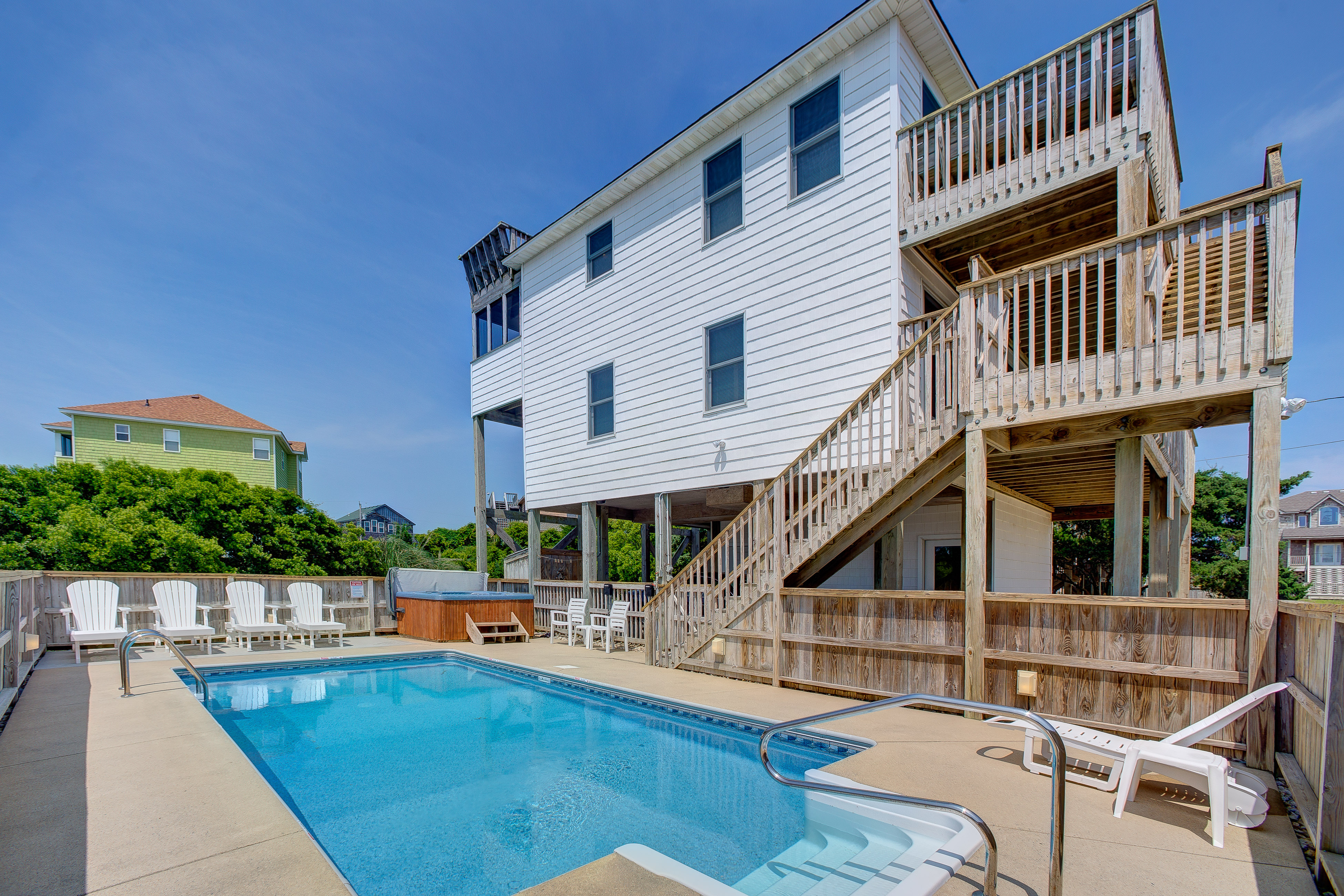 Home with easy beach access, private saltwater pool/hot tub, & rooftop deck