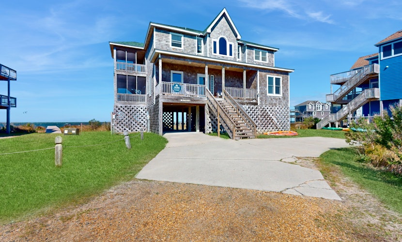 Waterfront home with private hot tub, sound access, fireplace & pool