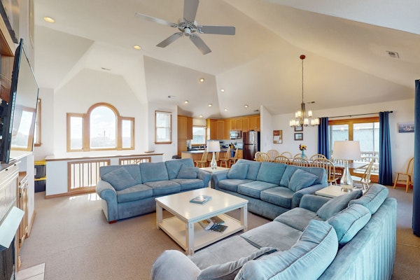 Waterfront home with private hot tub, sound access, fireplace & pool