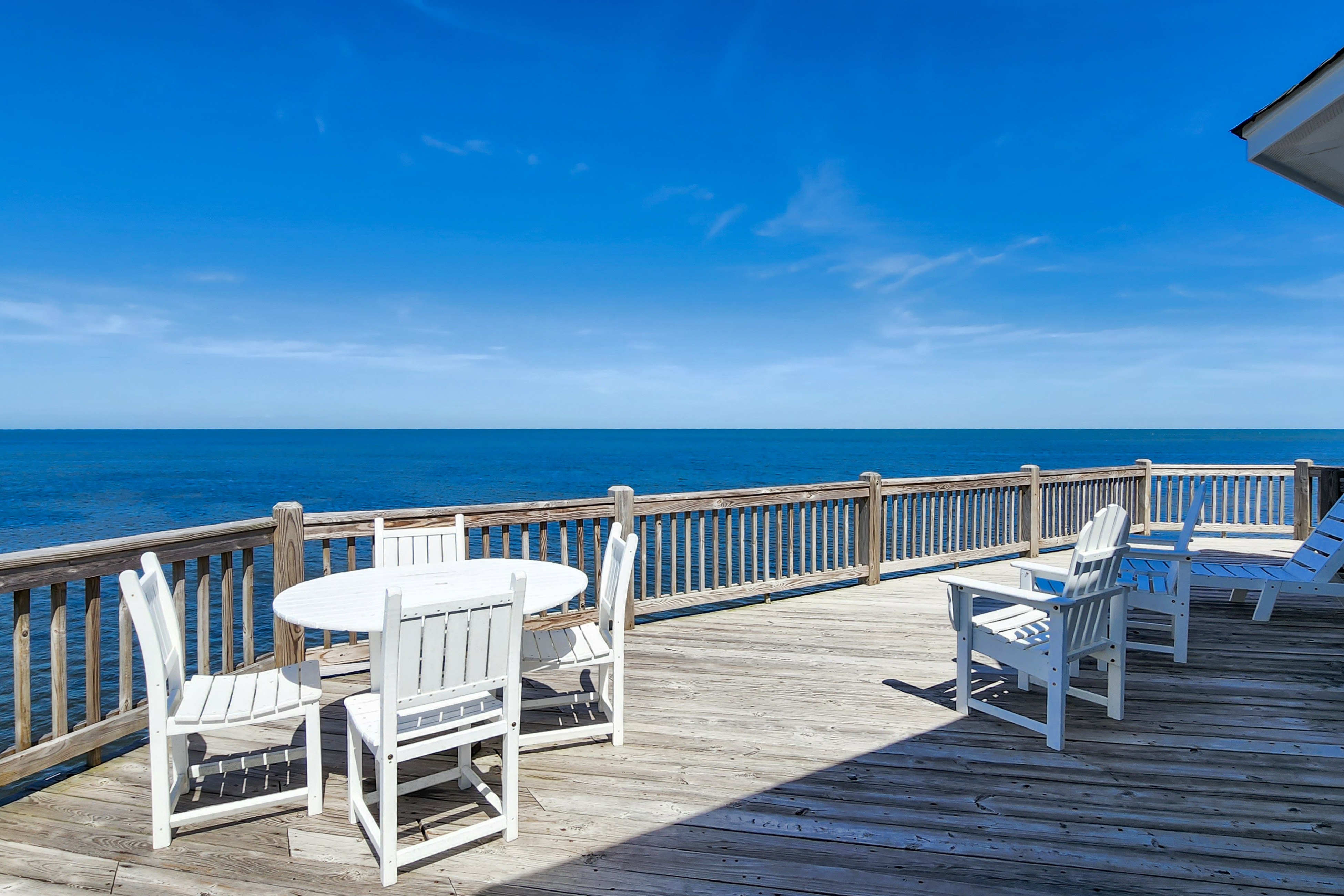 Waterfront home w/ private hot tub, sunset views, WiFi, W/D, & shared pool