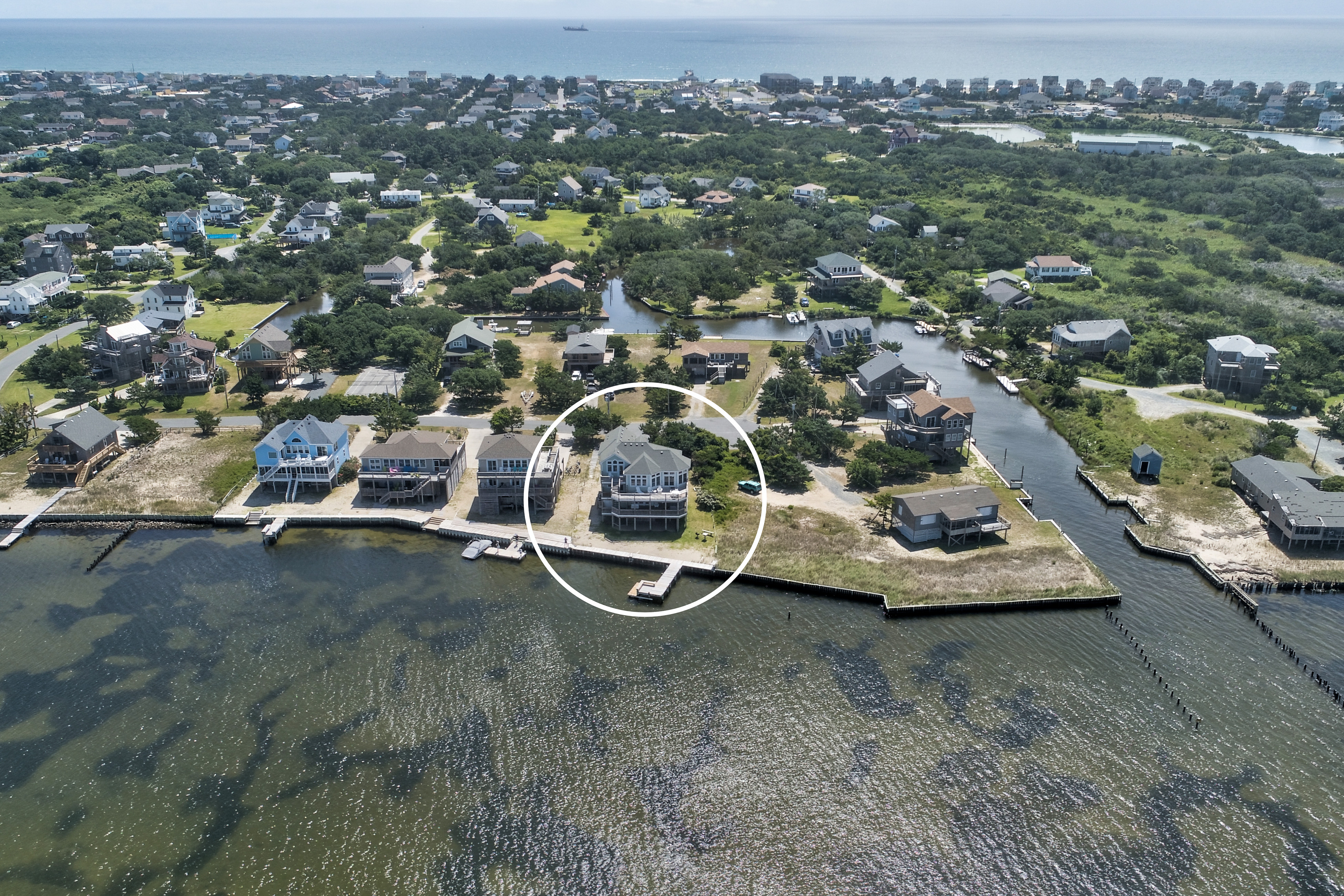 Waterfront home w/ private hot tub, sunset views, WiFi, W/D, & shared pool