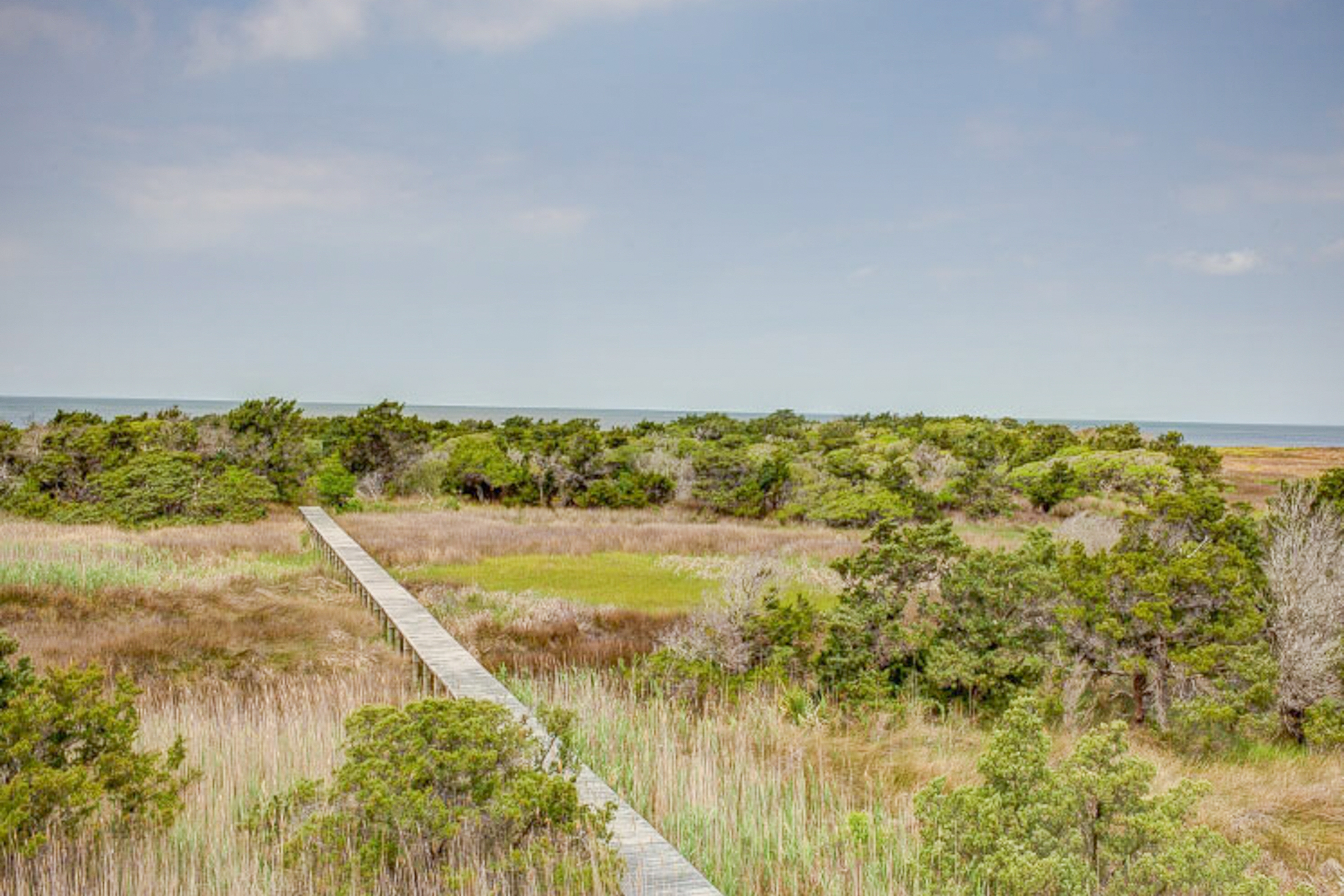 Soundfront home w/private hot tub, game room, fast WiFi, fish cleaning table