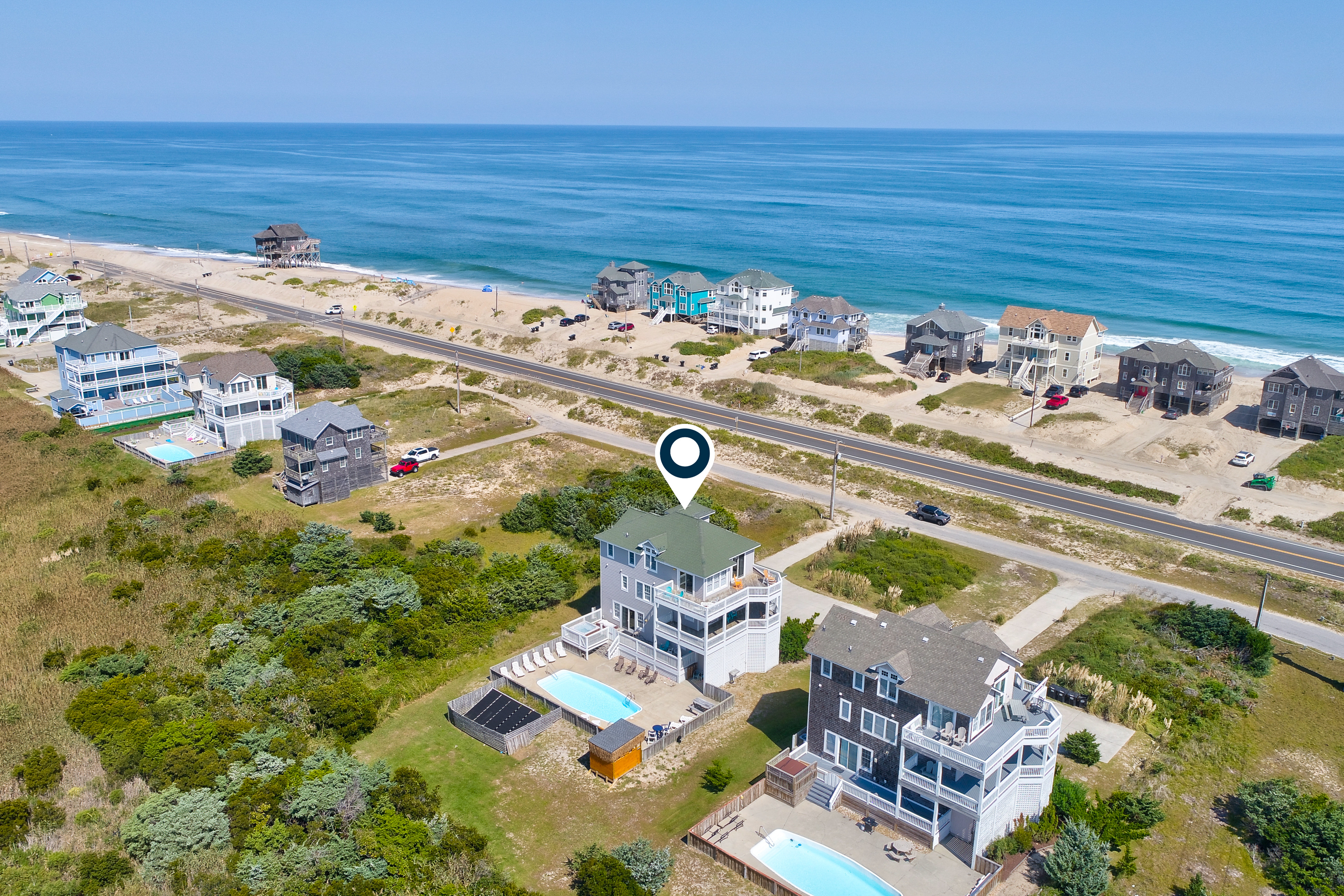 Ocean-view home with private outdoor pool, hot tub, central AC, tennis & decks