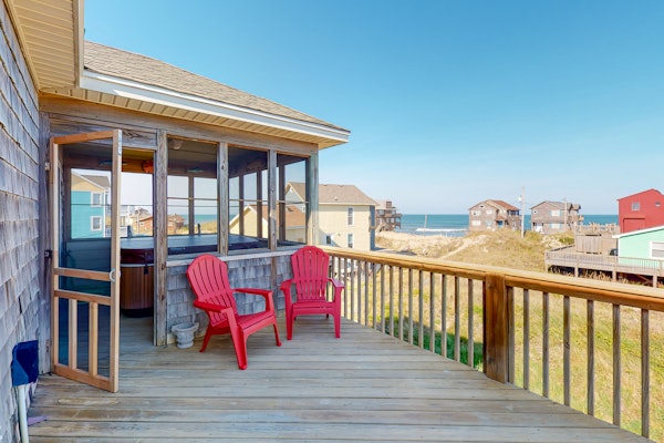Enjoy a semi-oceanfront getaway, just two houses away from easy beach access!