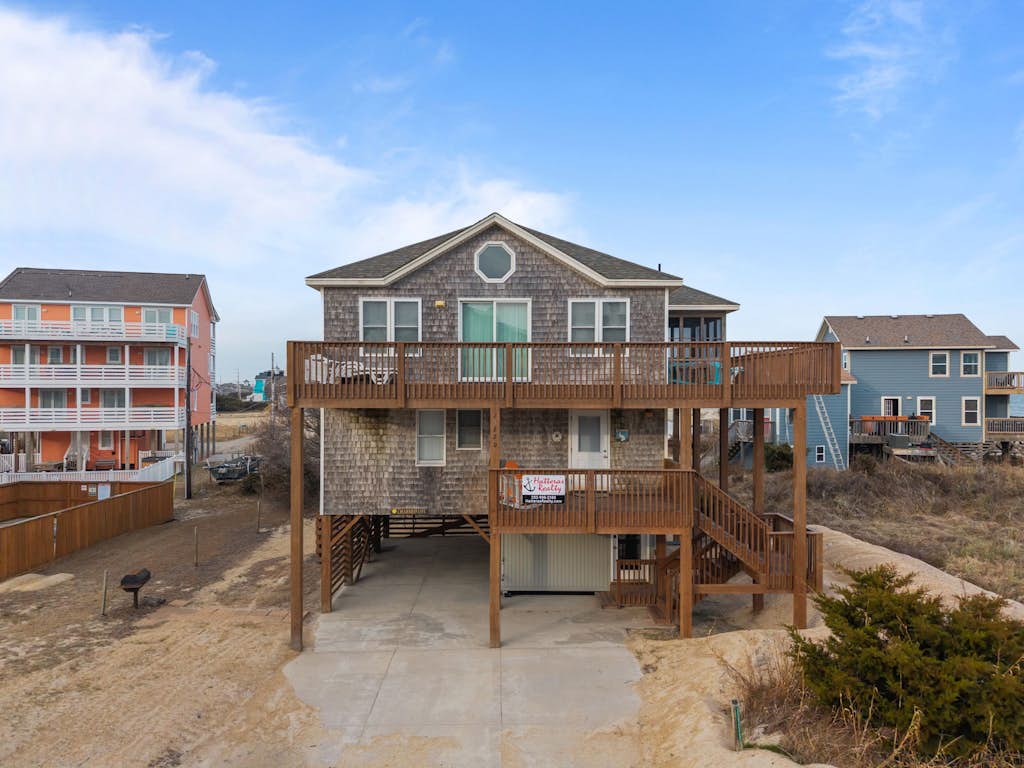 Enjoy a semi-oceanfront getaway, just steps  away from easy beach access!