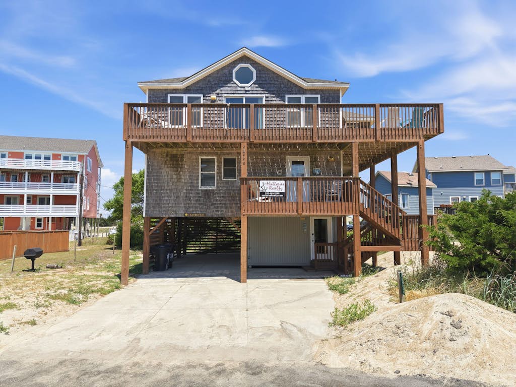 Enjoy a semi-oceanfront getaway, just steps  away from easy beach access!