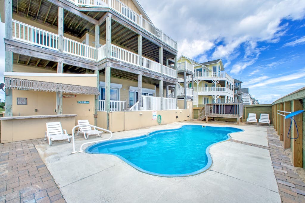 Oceanfront home with ocean view, private hot tub, outdoor pool, & central AC