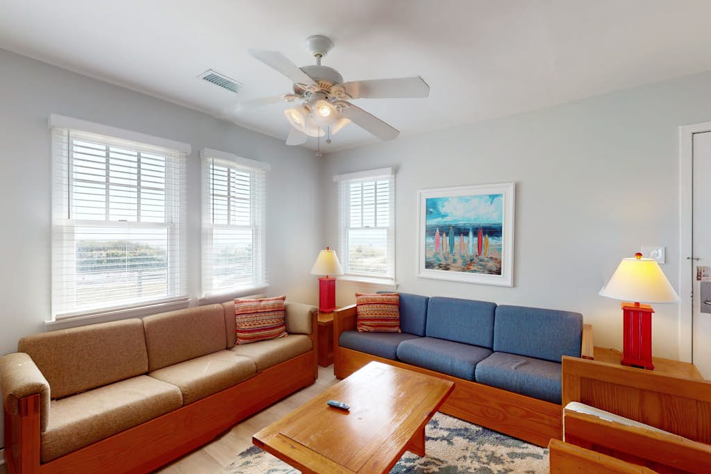 Gorgeous ocean-view townhouse with central AC, private W/D, patio, & pool access
