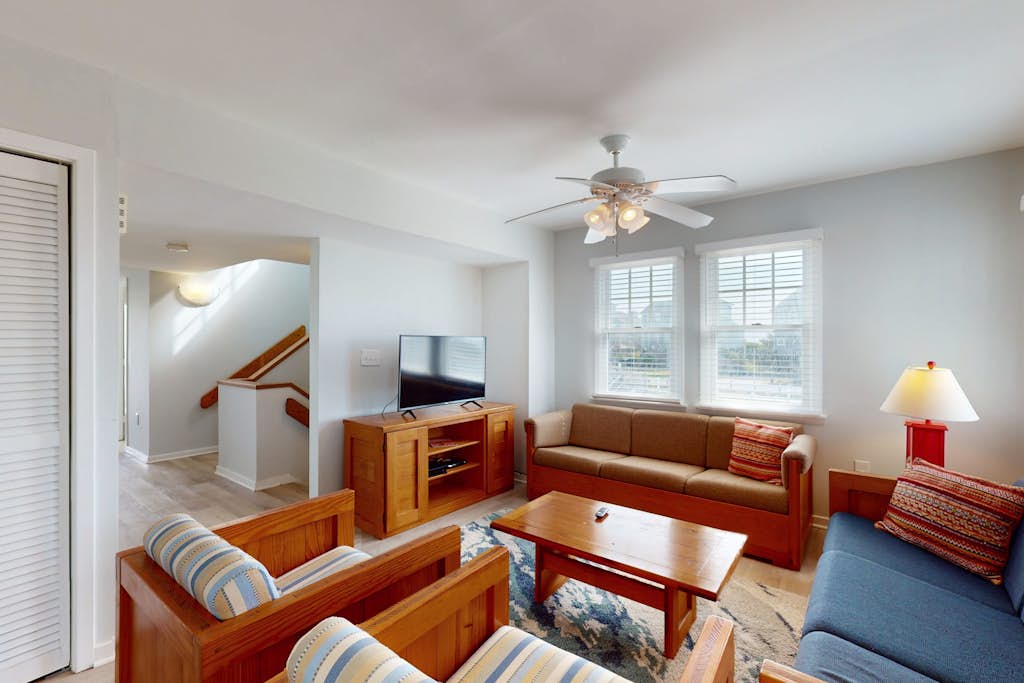 Gorgeous ocean-view townhouse with central AC, private W/D, patio, & pool access