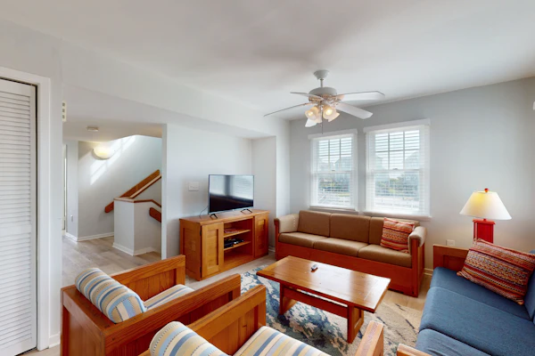 Gorgeous ocean-view townhouse with central AC, private W/D, patio, & pool access