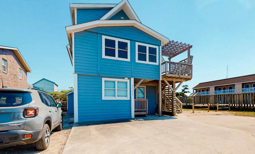 Coastal home with three decks, outdoor shower, AC, & W/D - near beach