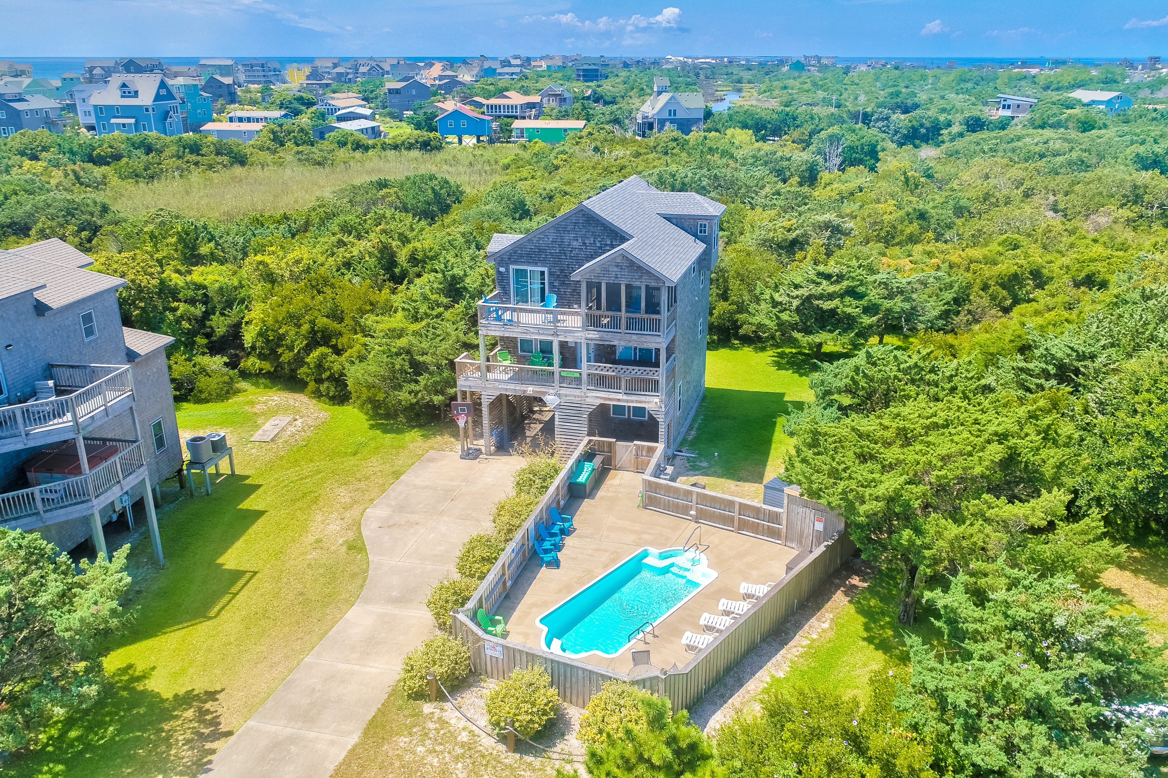 Waterfront house near beach access with AC, private pool & hot tub -dog-friendly