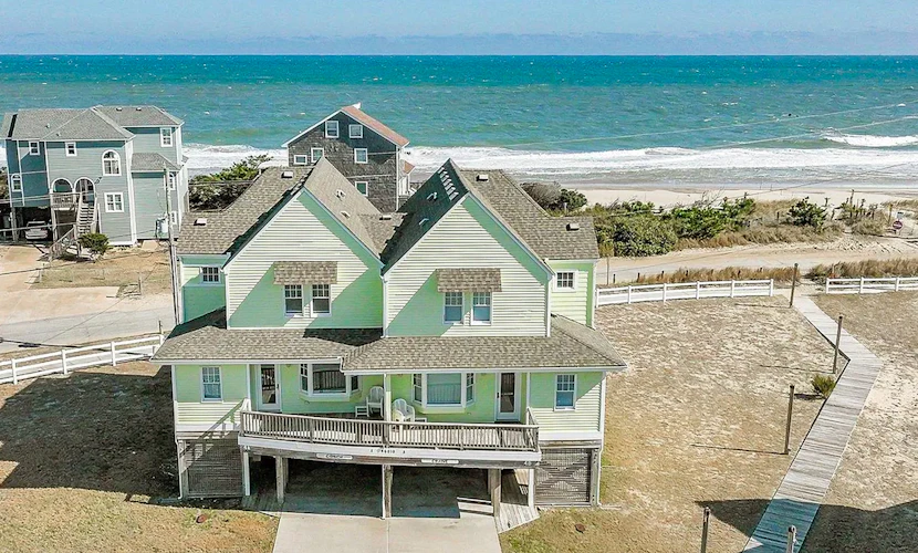 Beautiful Buxton townhouse with ocean view - pool access, washer/dryer & AC