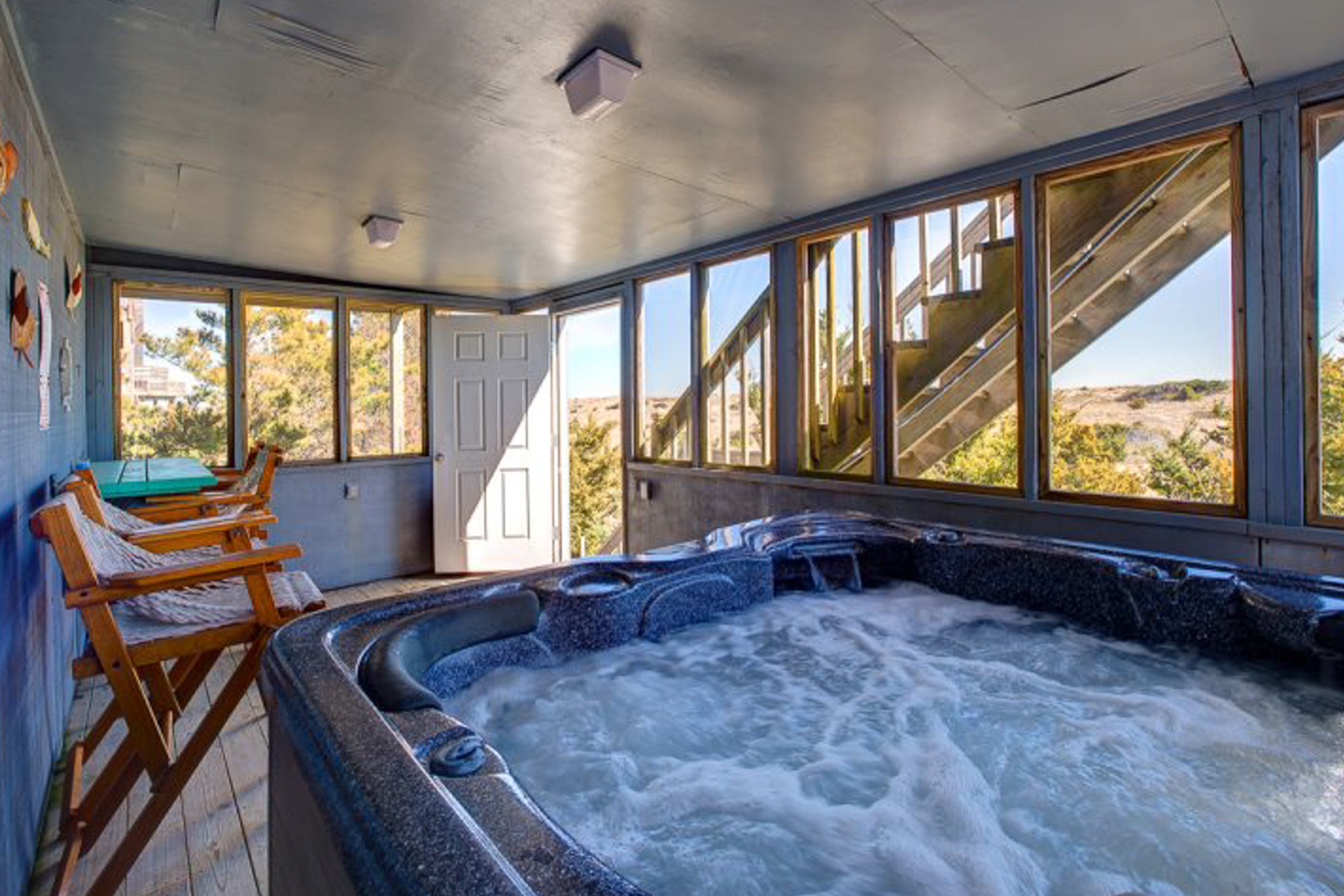 Beautiful dog-friendly home overlooking the beach with hot tub, WiFi, & AC