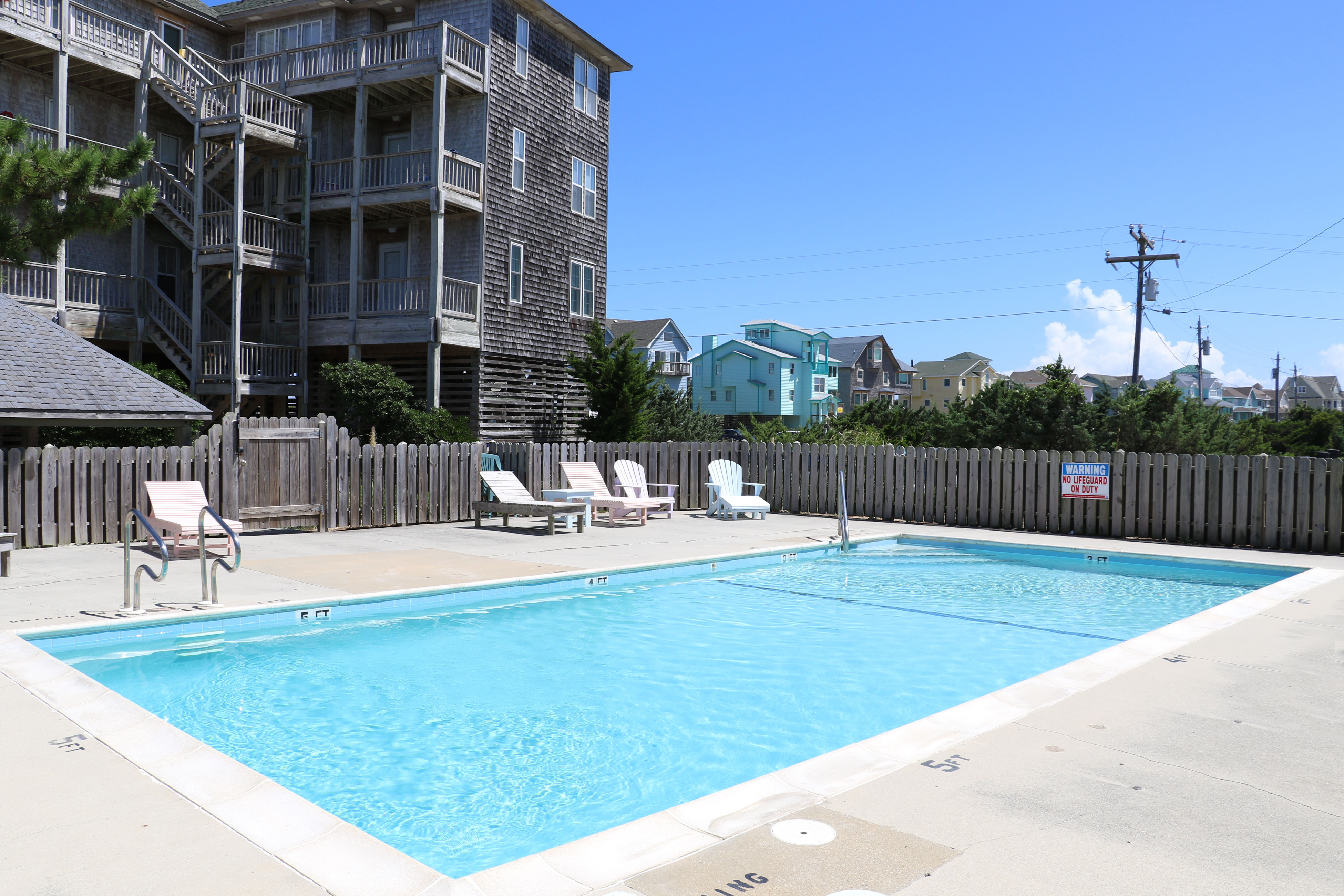 Beautifully updated condo with outdoor pool, beach access, AC & washer/dryer