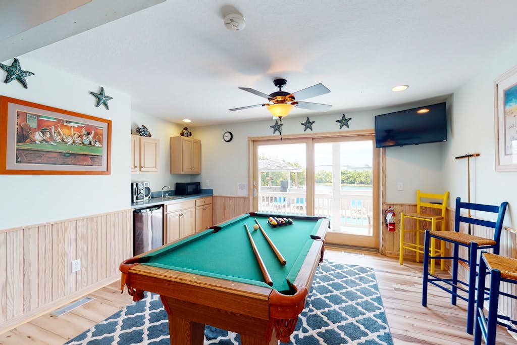 Waterfront home with theatre, private pool & hot tub - dog-friendly