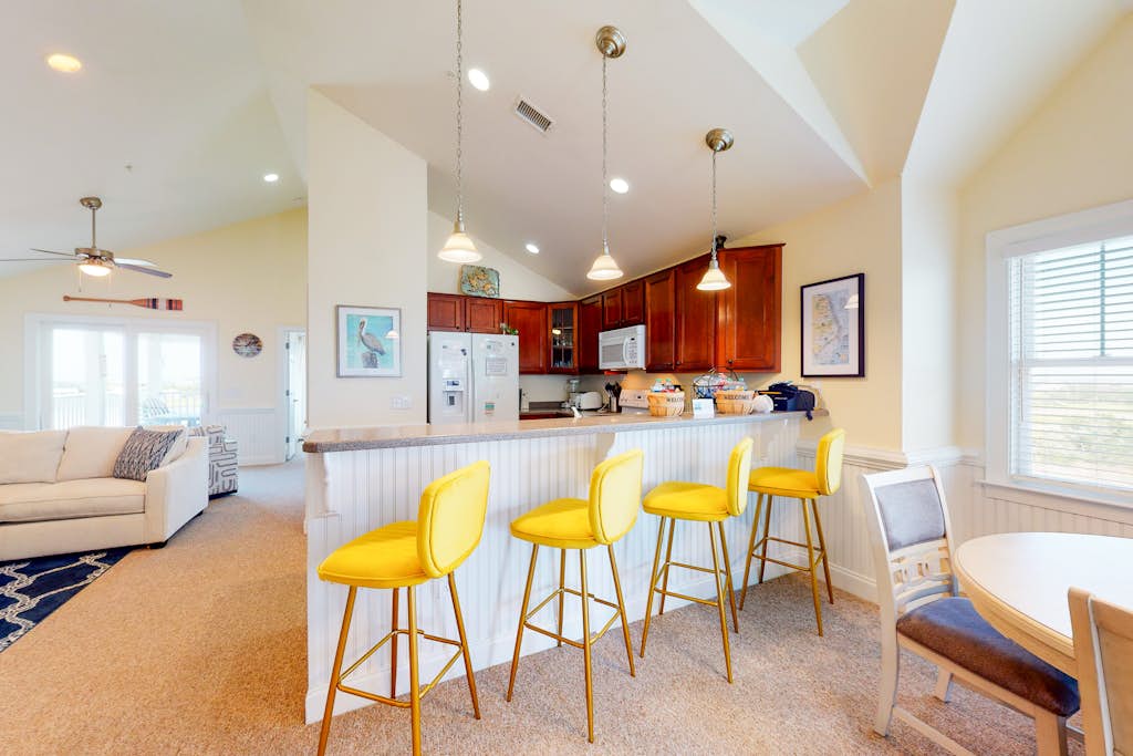 Waterfront condo with private washer/dryer, pool, water views, and free WiFi