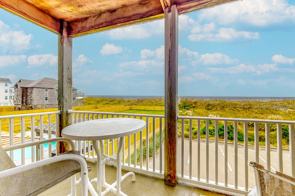 Oceanfront condo with private balcony, hot tub, outdoor pool, & pool table