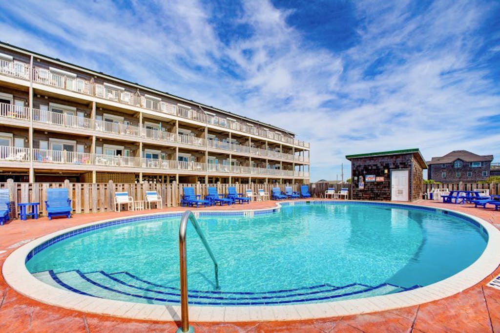 Oceanfront condo with private balcony, hot tub, outdoor pool, & pool table