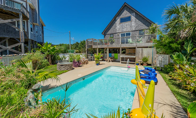 Dog-friendly home with private pool, firepit, fenced yard, covered patio, & deck