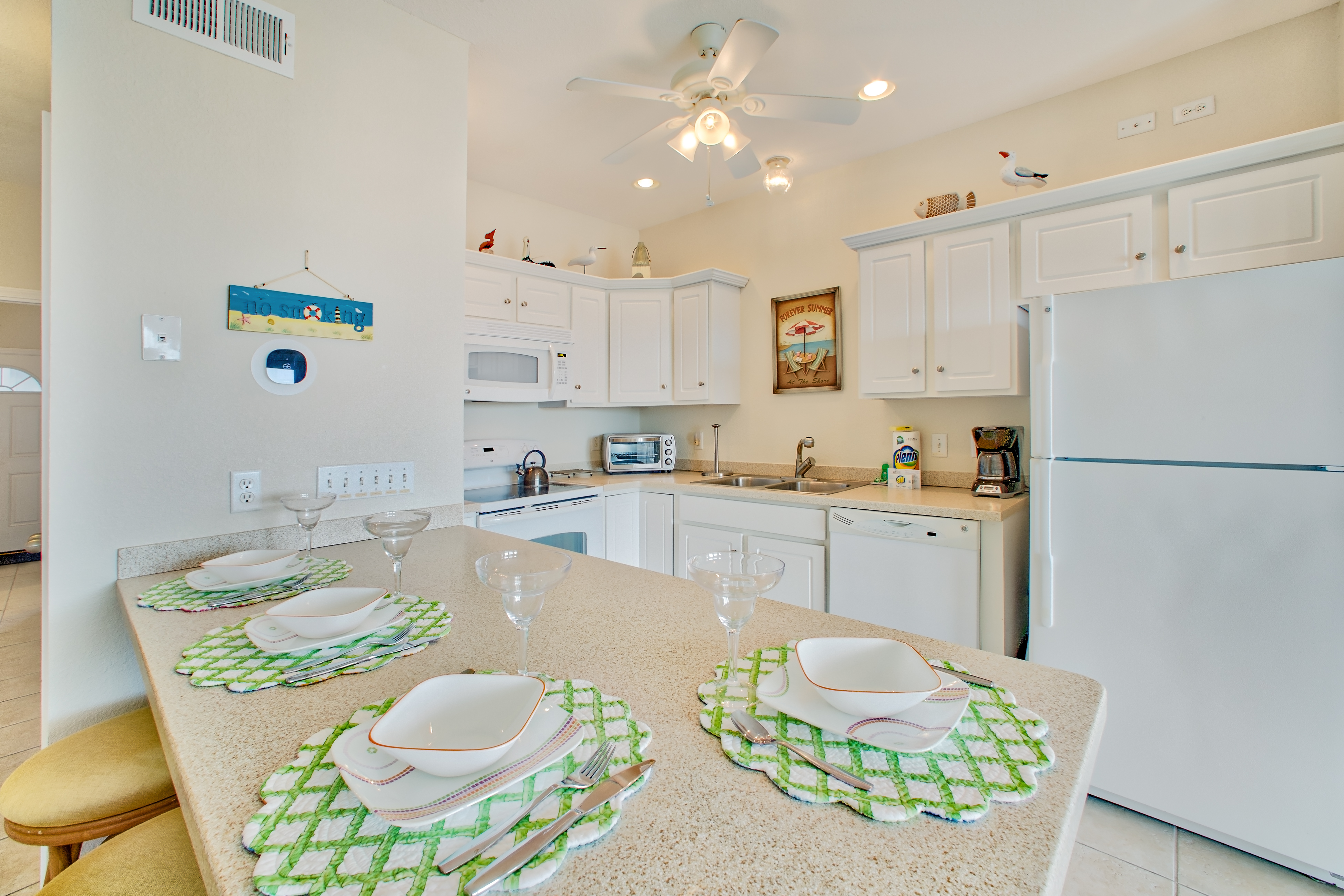 Oceanfront, dog-friendly condo with pool, hot tub, large deck, fast WiFi, & view