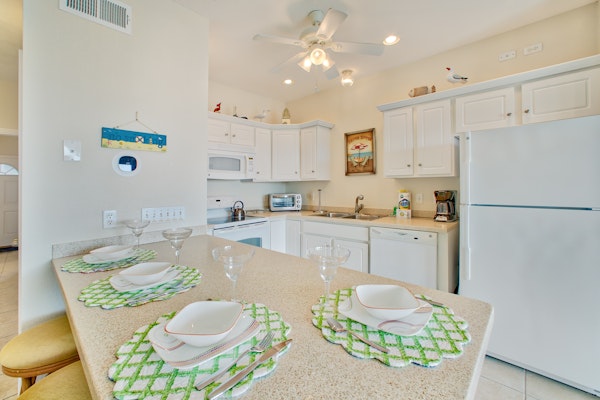 Oceanfront, dog-friendly condo with pool, hot tub, large deck, fast WiFi, & view