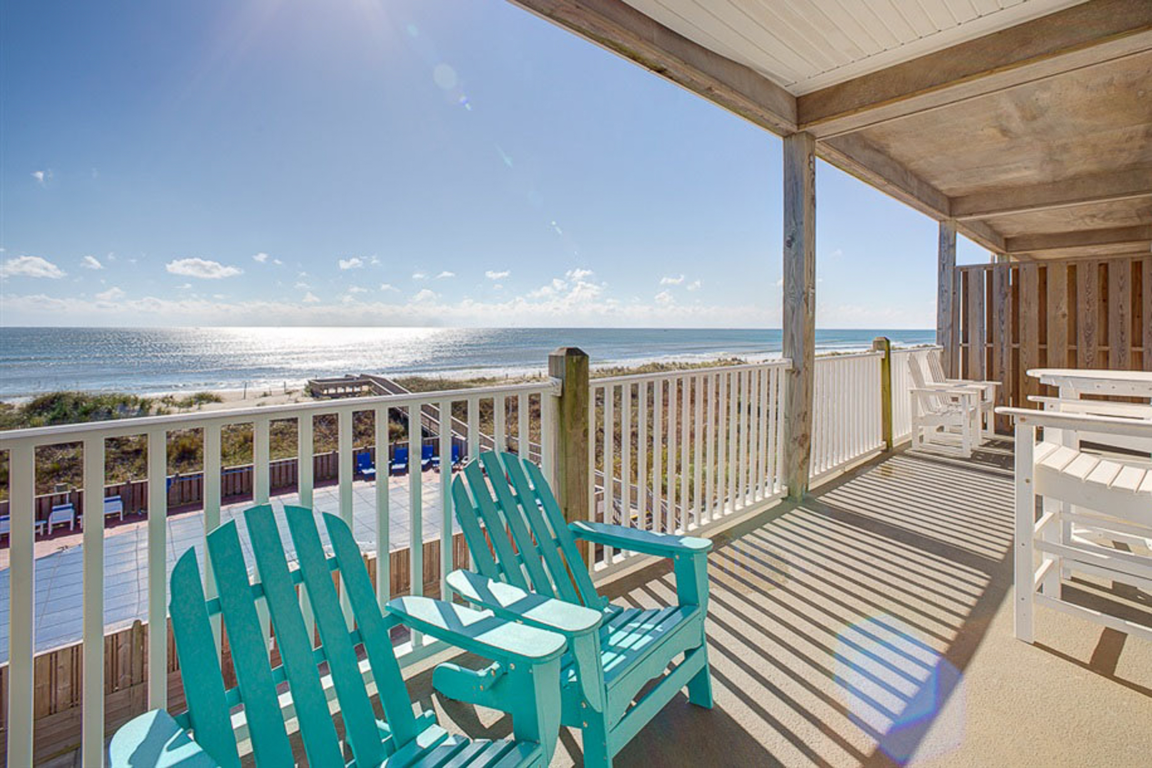 2nd-floor oceanfront condo with outdoor pool, hot tub, private waterfront balcony