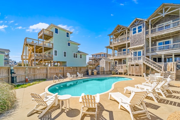 Sprawling & luxe home with pool, hot tub, balconies, grill, game room, & AC