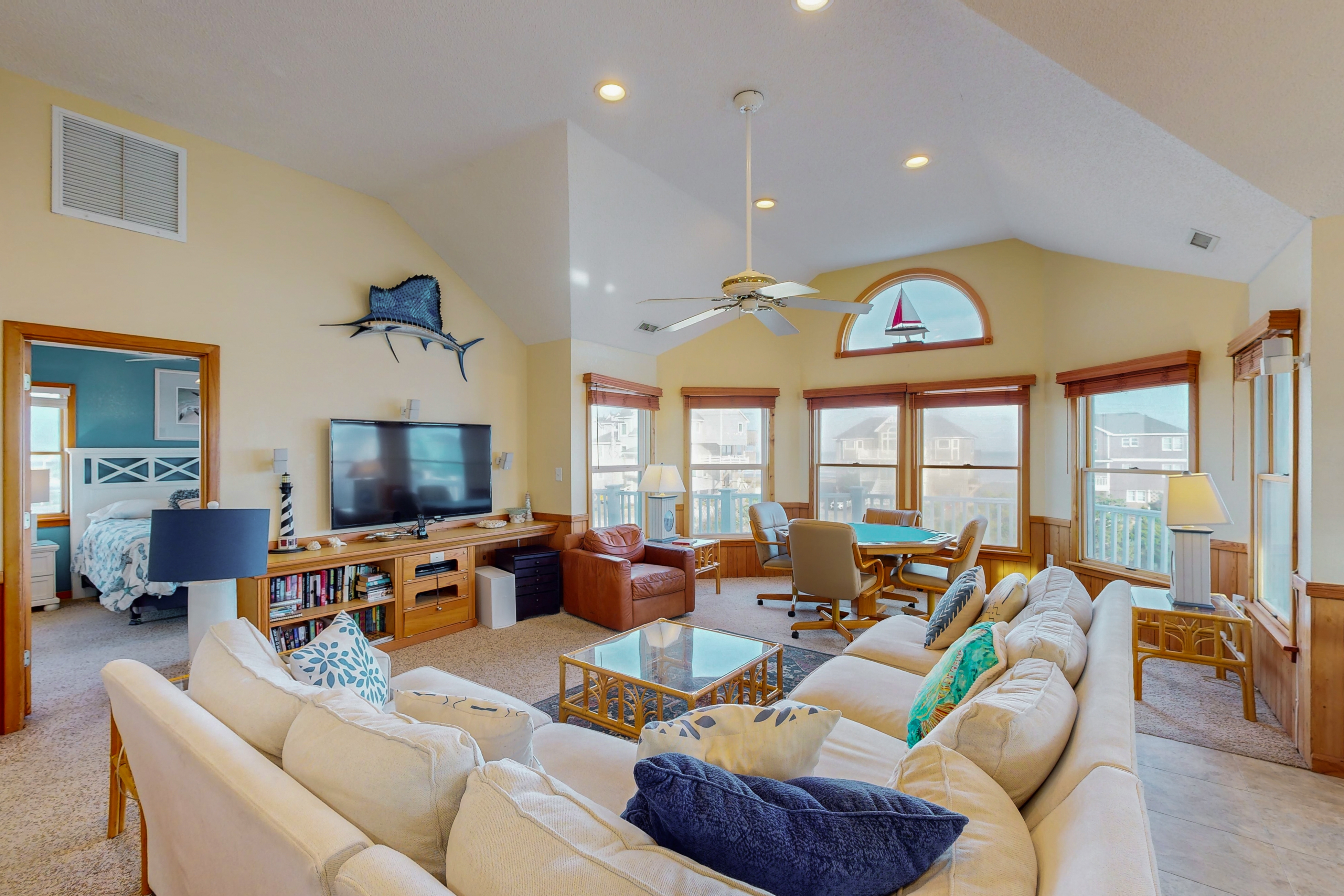 Ocean-view house with pool, hot tub, game room, balcony, deck, & beach access