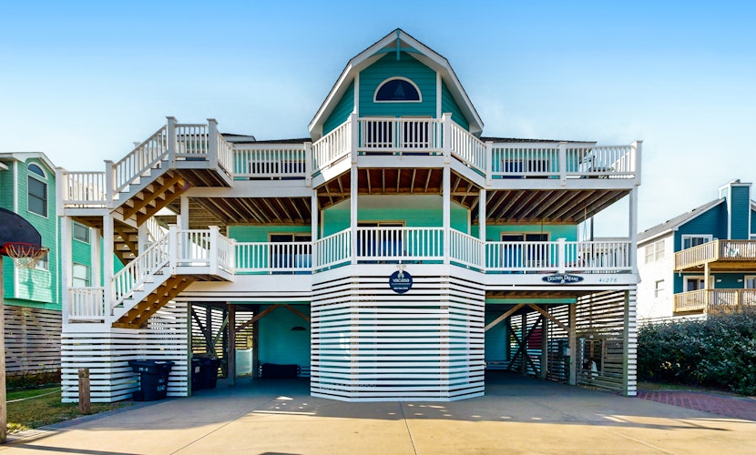 Ocean-view house with pool, hot tub, game room, balcony, deck, & beach access