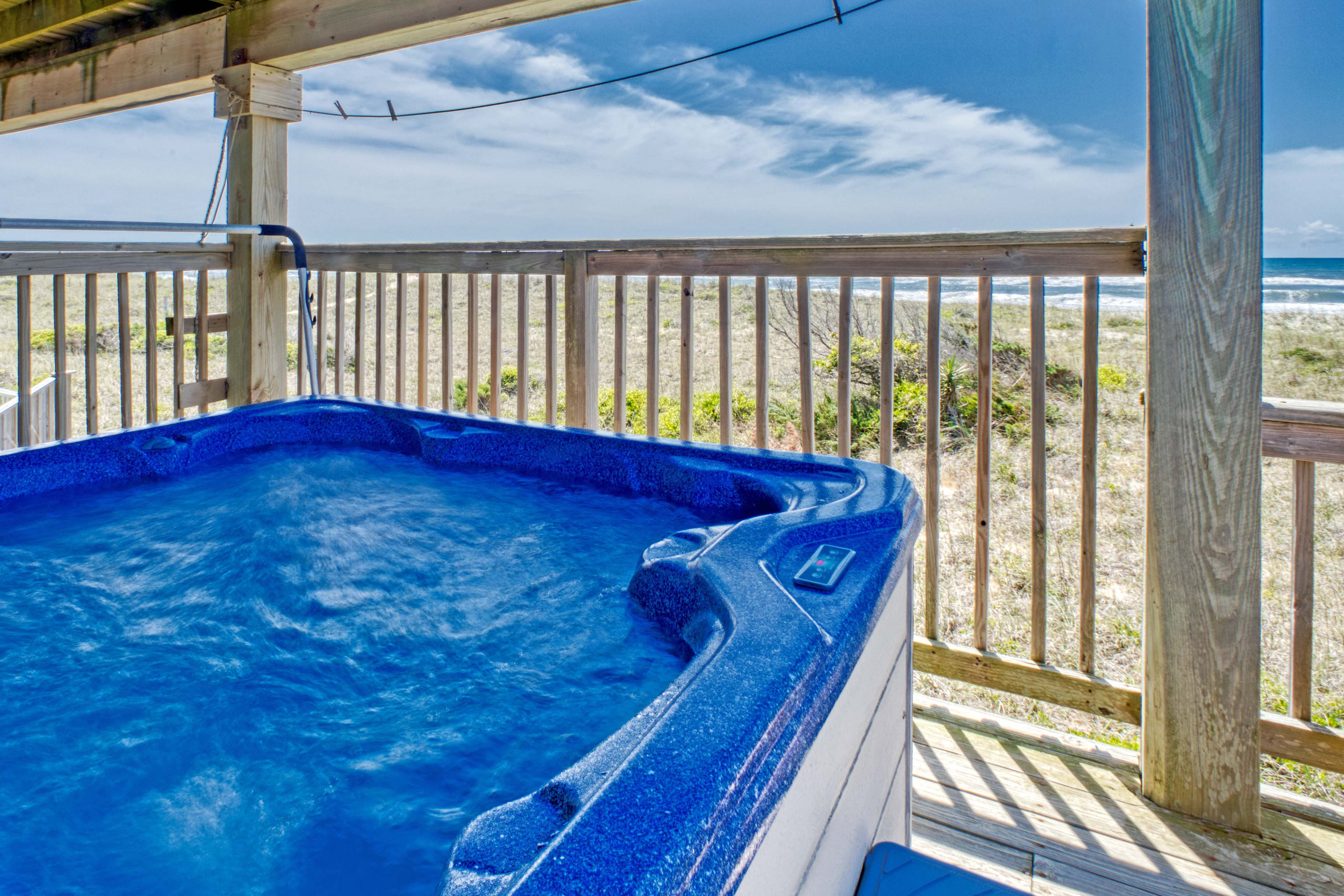 Oceanfront home w/elevator, private hot tub, shared pool, beach access, & WiFi