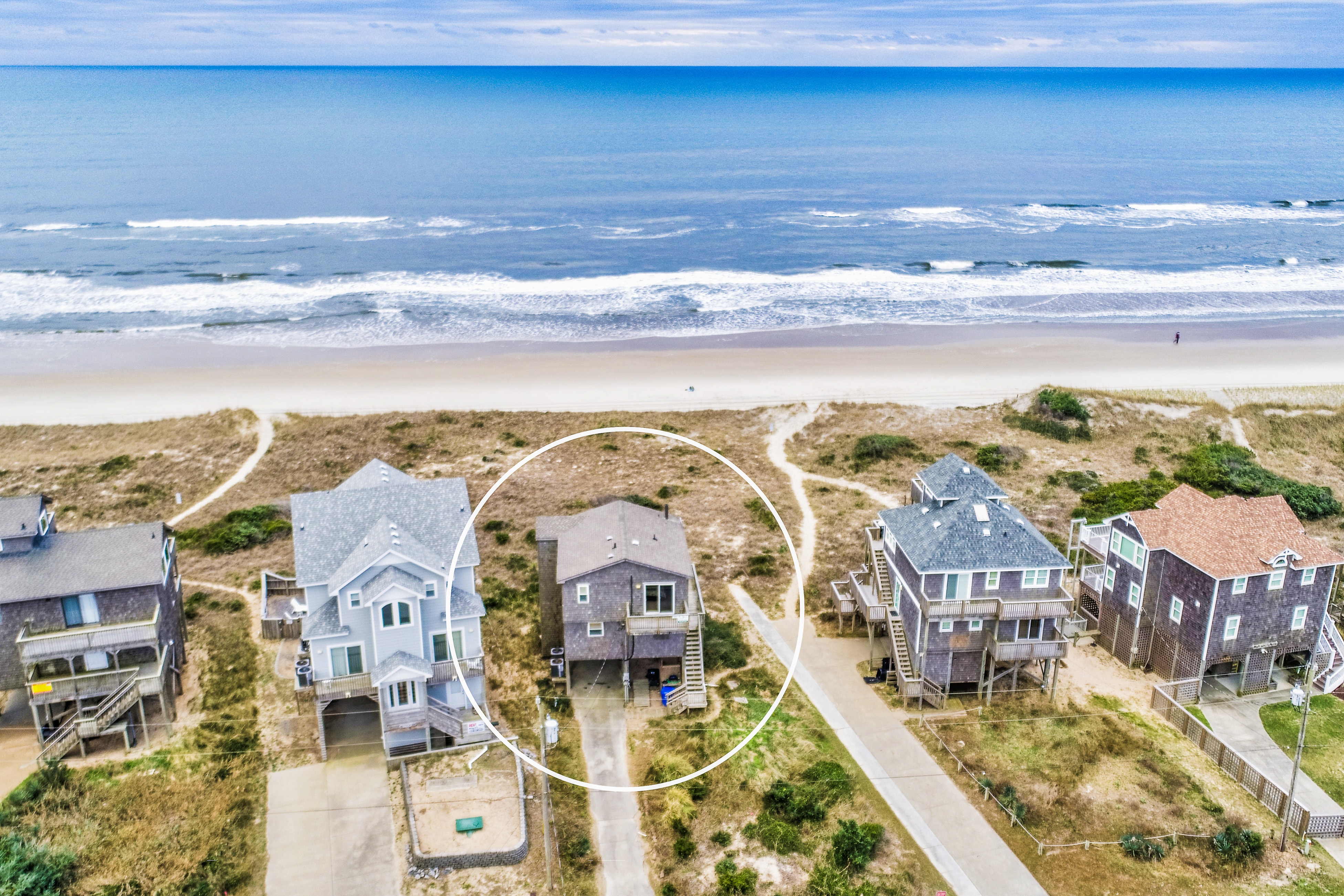 Oceanfront home w/elevator, private hot tub, shared pool, beach access, & WiFi