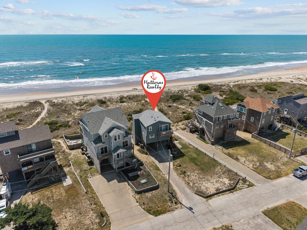 Oceanfront home w/elevator, private hot tub, shared pool, beach access, & WiFi