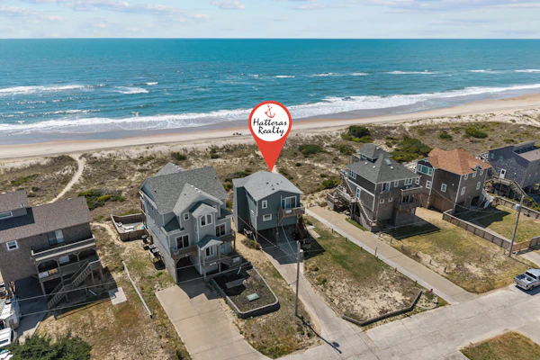 Oceanfront home w/elevator, private hot tub, shared pool, beach access, & WiFi