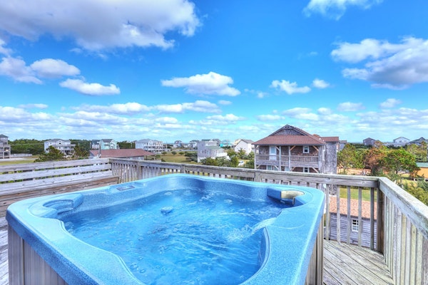 Handsome raised home with private hot tub, & central AC