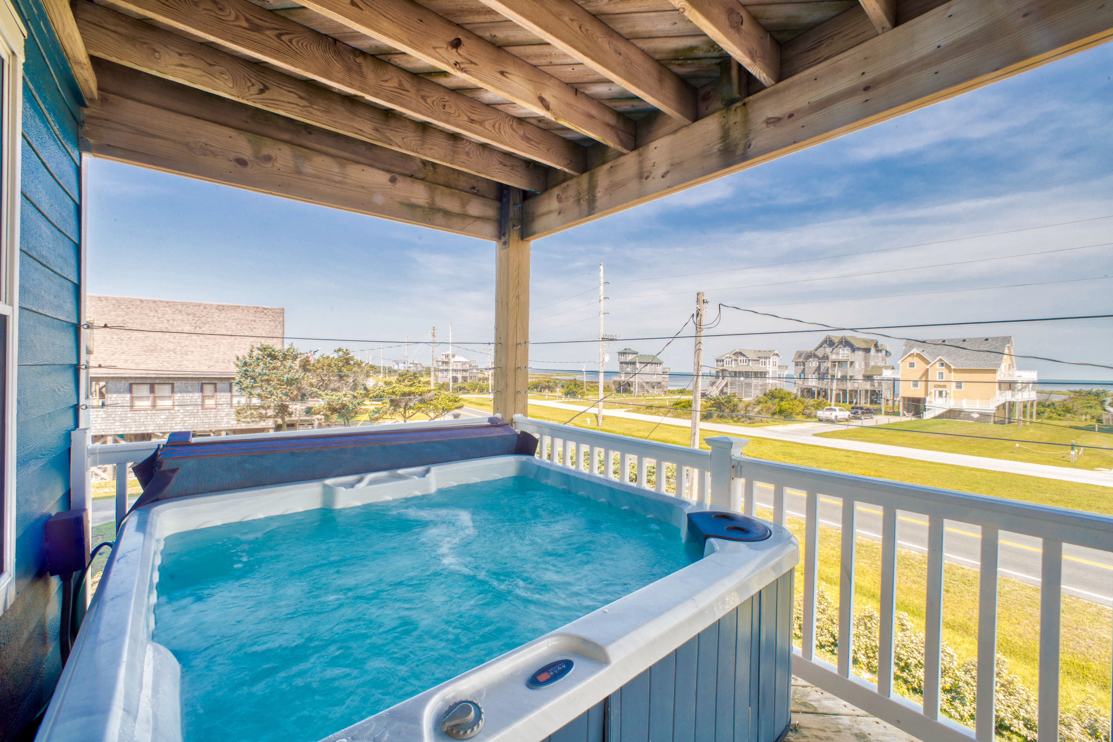 Dog-friendly home with hot tub, sunset sound view, & game room