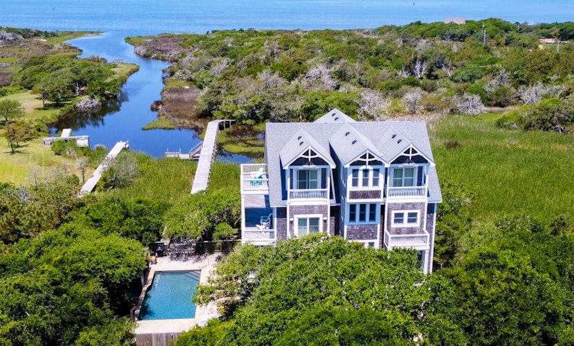 Waterfront home with ocean views, private pool & hot tub