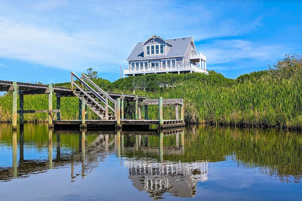 Waterfront home with ocean views, private pool & hot tub