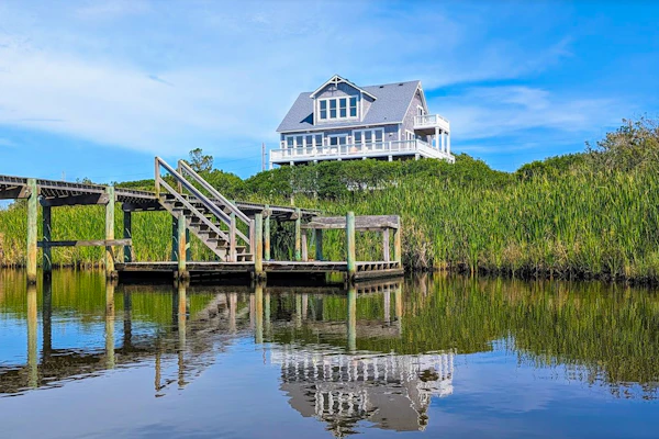 Waterfront home with ocean views, private pool & hot tub