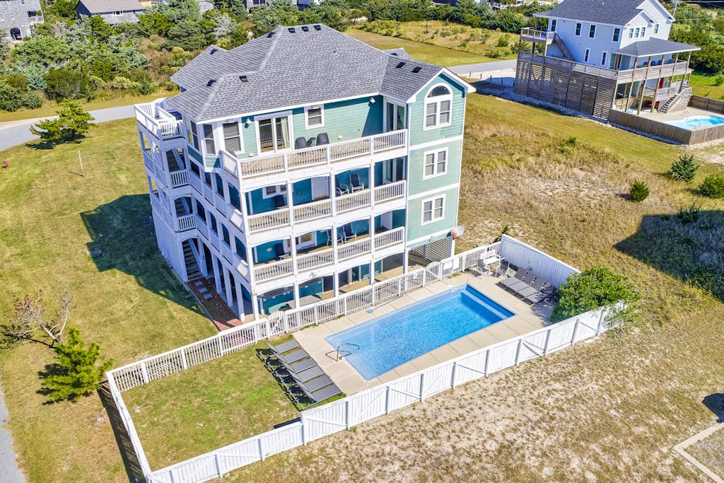 Stately and dog-friendly beach home near water with private pool & hot tub