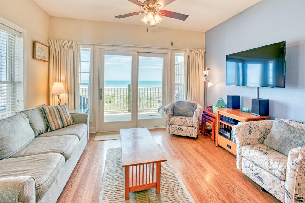 Second-floor oceanfront home with outdoor pool, hot tub, pool table, & W/D