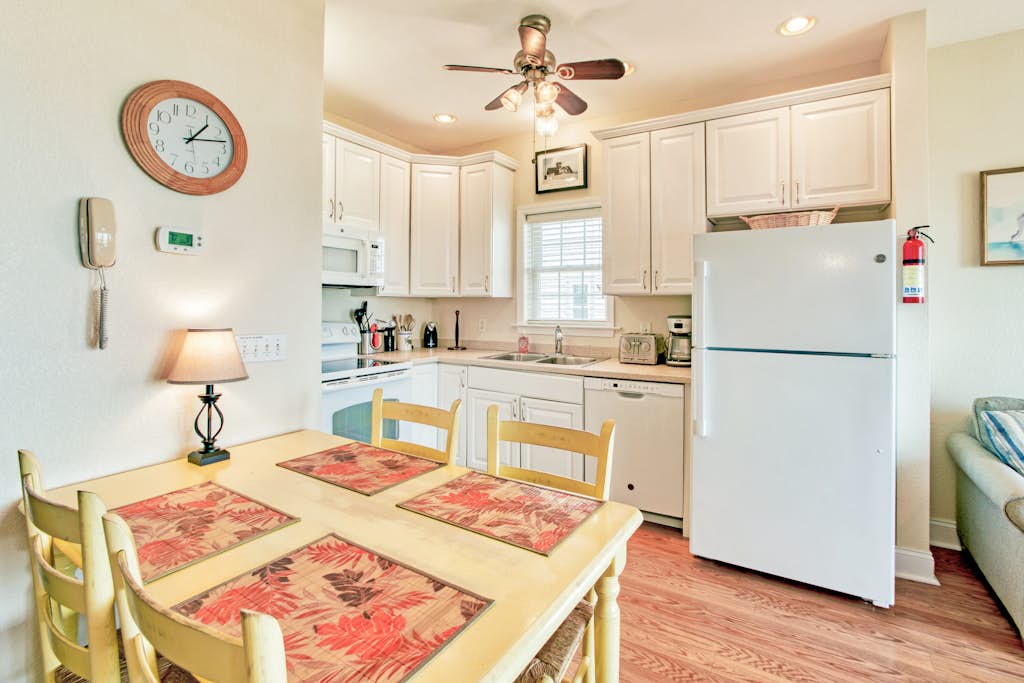 Second-floor oceanfront home with outdoor pool, hot tub, pool table, & W/D