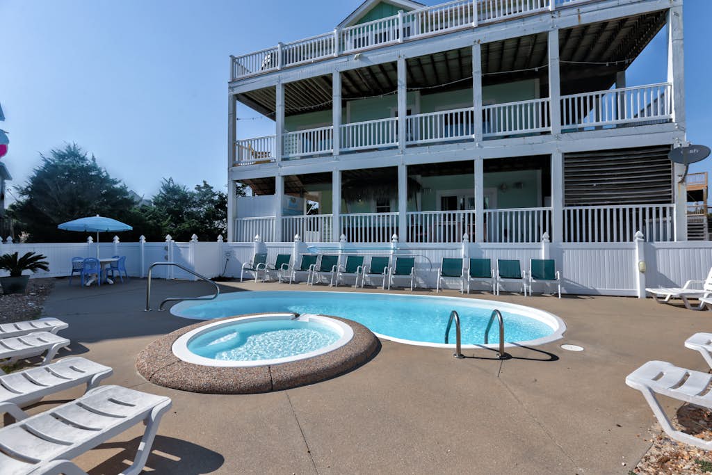 Dog-friendly beach home with private pool, hot tub, AC, pool table & game room