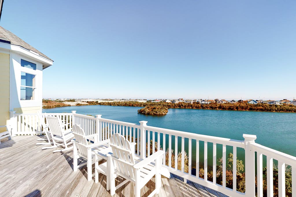 Lakefront, dog-friendly home with W/D, private pool & hot tub - close to beach